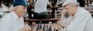 Man pondering next move in a chess game