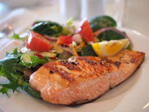 Dinner plate with salmon and vegetables