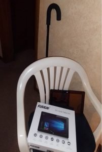 New Tablet Resting on Chair By Walking Cane
